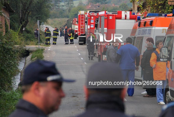 Bulgarian policemen, firemen and medical crew attend in a 4 kilometers away secure zone from a scene of blast at Explosives Plant