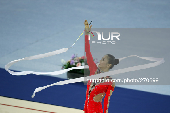 (141002) -- INCHEON, Oct. 2, 2014 () -- Deng Senyue of China performs during the individual all-round final of gymnastics rhythmic at the 17...
