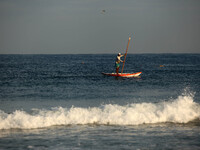 Palestinian fishermen during work on fishing in the Sea of ​​Gaza City's third day of Eid al-Adha (