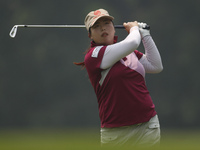 Shanshan Feng of China watches her shot on the fairway of hole 9 during the second round of the LPGA Malaysia golf tournament at Kuala Lumpu...