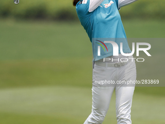 Na Yeon Choi of South Korea watches her second shot from the fairway of hole 10 during the second round of the LPGA Malaysia golf tournament...