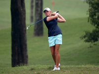 Stacy Lewis of the USA takes her second shot from the rough of the eighteenth hole during the third round of the LPGA Malaysia golf tourname...