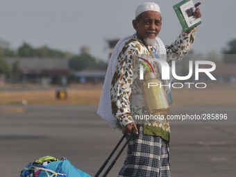 SURAKARTA, INDONESIA - October 10 : Muslim pilgrims arrived at Adi Soemarmo international airport, in Surakarta, Central Java, Indonesia, on...