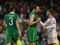 Republic of Ireland's John O'Shea and Gibraltar's Lee Casciaro during a UEFA 2016 European Championship qualifing football match between the...