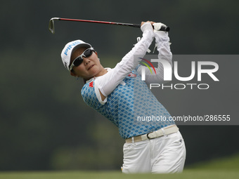 Ayaka Uehara of Japan watches her second shot on the fairway of hole nine during the fourth round of the LPGA Malaysia golf tournament at Ku...