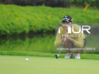 So Yeon Ryu  of South Korea lines up for a putt on the green of the eighteenth hole during the fourth round of the LPGA Malaysia golf tourna...