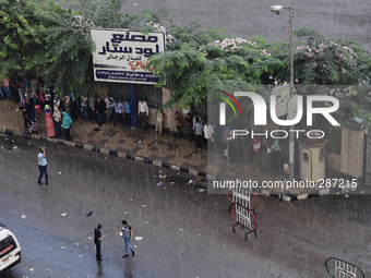 Heavy rains fall in Mansoura as a start of winter after about two months of unstable climatic conditions, in Mansoura, Egypt, on October 12,...