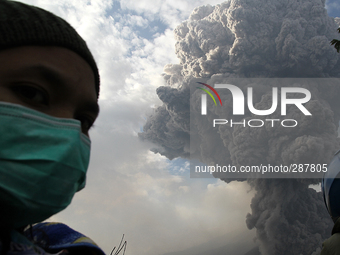 Residents are among Sinabung volcano eruption with lava blowing a giant black cloud of volcanic ash after the latest eruption of Mount Sinab...
