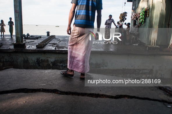 A crack found at the road that lied at launch terminal of Char Alexander, Ramgoti, Bangladesh. Thousands of people become homeless after the...
