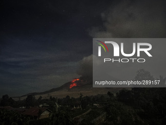 Hot Lava Volcanic spew from the Mount Sinabung seen from the Tiga Serangkai village, Simpang Empat Districk, Karo, North Sumatra. Indonesia....