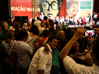 Supporters of the Brazil's President Dilma Rousseff, presidential candidate for re-election from the Workers Party (PT), make a selfie durin...