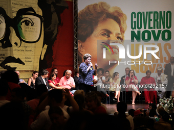 Brazil's President Dilma Rousseff, presidential candidate for re-election from the Workers Party (PT), speaks during a meeting with teachers...