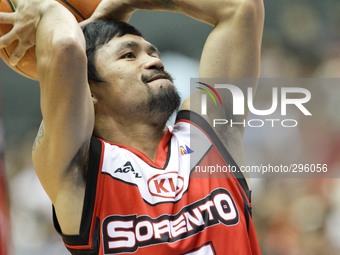 Bocaue, Bulacan Philippines - Manny Pacquiao of Kia warms up before their game against Blackwater on the 40th season opening of the Philippi...