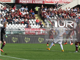 Torino midfielder Alessandro Gazzi (14) pull the jersey of Udinese forward Cyril Thereau (77) into the box during the Serie A football match...