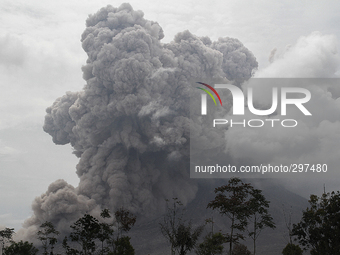 Sinabung volcano with lava blowing a giant black cloud of volcanic ash after the eruption launched the latest in Karo, Sumatra, Indonesia Oc...
