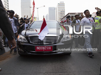 Indonesia 1 Jokowi car joining the convoy. Jokowi inauguration celebration held arround Hotel Indonesia roundabout to Indonesian Palace as t...