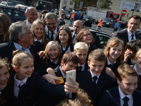 Polish President, Bronisław Komorowski, takes a selfie with a group of young students as he leaves ICE Krakow Cenetr after meeting with 600...