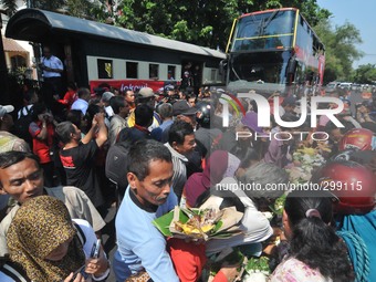 SURAKARTA, INDONESIA - October 20 : Residents hold a street celebration of the inauguration Indonesian new president in Surakarta, Central J...