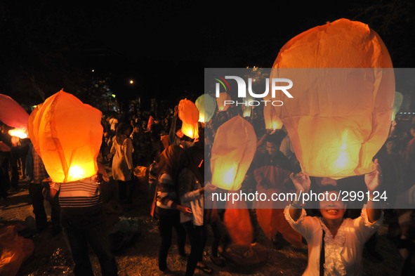 SURAKARTA, INDONESIA - October 20 : Peoples lit a lanterns which symbolize a new hope during the celebration of the inauguration of the new...