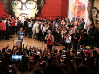 Brazil's President Dilma Rousseff, who is running for re-election for the Workers Party (PT), participate in a campaign rally with intellect...