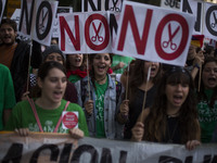 Students shout slogans during a protest against the government education reform and cutbacks in grants and staffing in Madrid, Spain, Thursd...