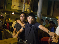 Local residents react to the Pro-Democracy protesters in Mong Kok, Kawloon, Hong Kong on Oct. 25 2014. Pro-Democracy protesters plan a refer...