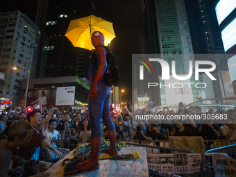 Man dressed as Spider-Man stands on barricade in the Pro-Democracy occupied camp in Mong Kok, Kawloon, Hong Kong on Oct. 25 2014. Pro-Democr...