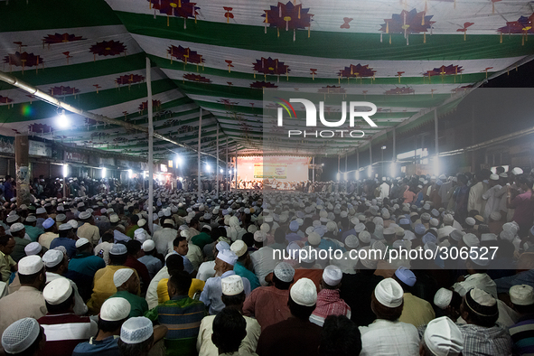 A group of imams were delivering their speech while thousands of peoples were listening to them. 