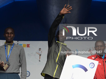 Kenia's Kibire Moses Kipruto wins PZU Cracovia half-marathon in 1:03:50. Rop Abel Kibet (Left) finishes 2nd in 1:03:51 and Mukule Martin Mui...