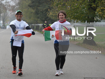A couple of runners from Poland and Mexico during the 1st Edition of PZU Cracovia half-marathon in 1:04:42. Krakow, Poland. 26th October 201...