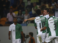 Sporting´s defender Paulo Oliveira (2nd R) celebrates with team mates after scoring a goal during the Portuguese League football match betwe...