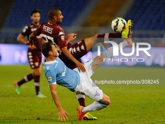 Radu and Peres during the Serie A match between SS Lazio and Torino at Olympic Stadium, Italy on October 26, 2014. (