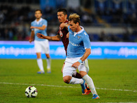 Biglia and Vives during the Serie A match between SS Lazio and Torino at Olympic Stadium, Italy on October 26, 2014. (