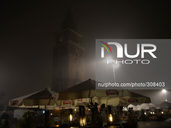'A foggy evening in Krakow' - A view of Town Hall Tower, 26th October 2014, Photo credit: Artur Widak/NurPhoto (
