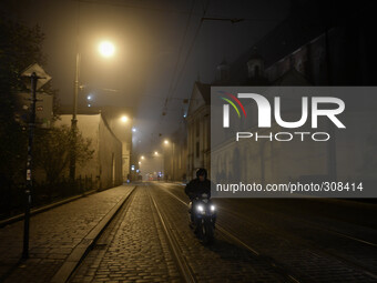 'A foggy evening in Krakow' - A view of Dominikanska street, 26th October 2014, Photo credit: Artur Widak/NurPhoto (