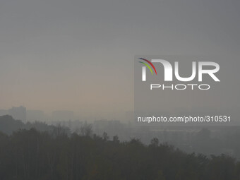 A view of the fog and an unhealthy smog at 2pm on the 28th of October 2014, visible over the city of Krakow from the Krakus Mound. Krakow, P...