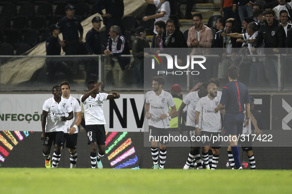 PORTUGAL, Guimarães: Vitoria SC's Côte D'Ivoire midfielder Bouba Saré celebrates after scoring a goal with team during Premier League 2014/1...