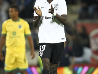 PORTUGAL, Guimarães: Vitoria SC's Côte D'Ivoire midfielder Bouba Saré celebrates after scoring a goal during Premier League 2014/15 match be...