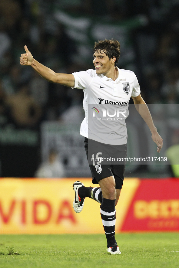 PORTUGAL, Guimarães: Vitoria SC's Portuguese defender João Afonso celebrates after scoring a goal during Premier League 2014/15 match betwee...