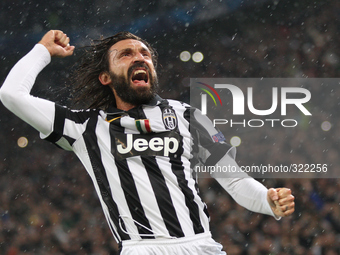 Juventus midfielder Andrea Pirlo (21) scores his goal and celebrates during the Uefa Champions League Group Stage football match n.4 JUVENTU...