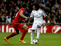 SPAIN, Madrid: Real Madrid's Brazilian Defender Marcelo and Liverpool´s Spanish Defender Javier Manquillo during the Champions League 2014/1...