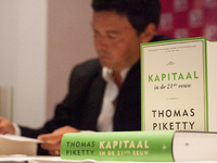 French economist Thomas Piketty visited the Netherlands on wednesday where he spoke to members of parliament and afterwards signed his new w...