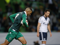 Sporting's forward Islam Slimani celebrates his goal  during the UEFA Champions League  group G football match between Sporting CP and FC Sc...