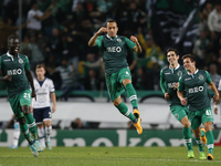 Sporting's defender Jefferson (C) celebrates his goal with his teammates during the UEFA Champions League  group G football match between Sp...