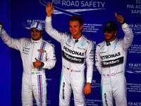 Williams' Felipe Massa (l) qualified in 3rd position; Mercedes' Nico Rosberg (c) and Lewis Hamilton (r), 1st and 2nd, respectively, at the 2...
