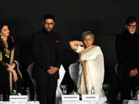 Indian film actors Amitabh Bachchan, (R), Abhishek Bachchan, (2L), Aishwarya Rai Bachchan (L) and Jaya Bachchan (