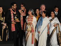 Indian film actors Amitabh Bachchan along her family Actor Abhishek Bachchan, , Actress Aishwarya Rai Bachchan  and  Actress Jaya Bachchan ,...
