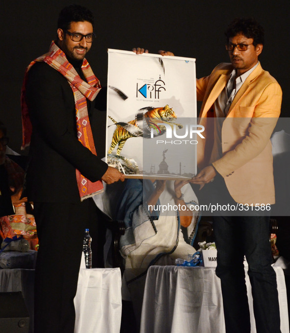 Actor Abhishek Bachhan , actor Irfan Khan  showing the poster of International Film Festival in Kolkata, India. 