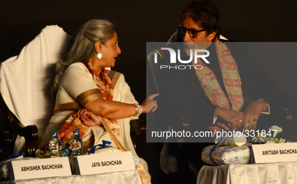 Jaya Bachhan talks with Amitabh Bachchan during the inauguration of the Kolkata International Film Festival in Kolkata, India. 