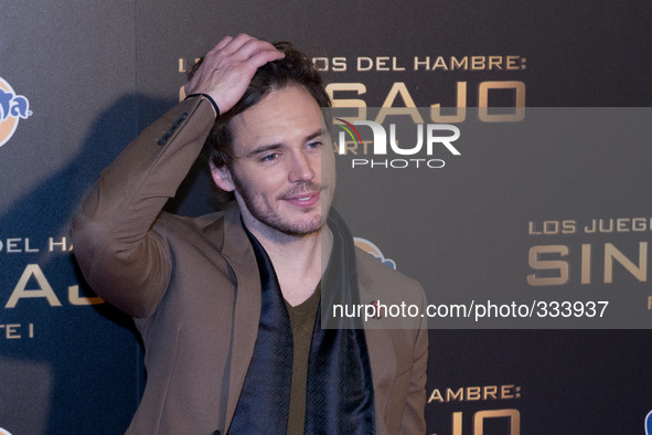 British actor Sam Claflin poses for the photographers during the Spain premiere of the movie 